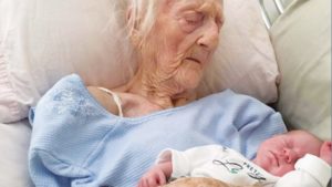 Old Woman Holding Baby